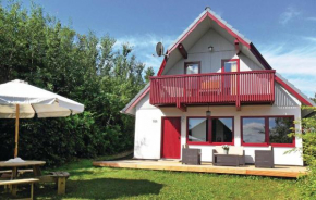 Отель Three-Bedroom Holiday home with Lake View in Kirchheim  Kemmerode